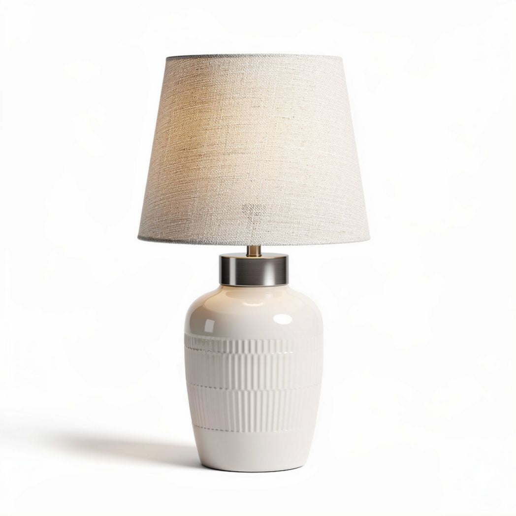 White ceramic table lamp with fabric shade and silver accent 25 x 25 x 50cm